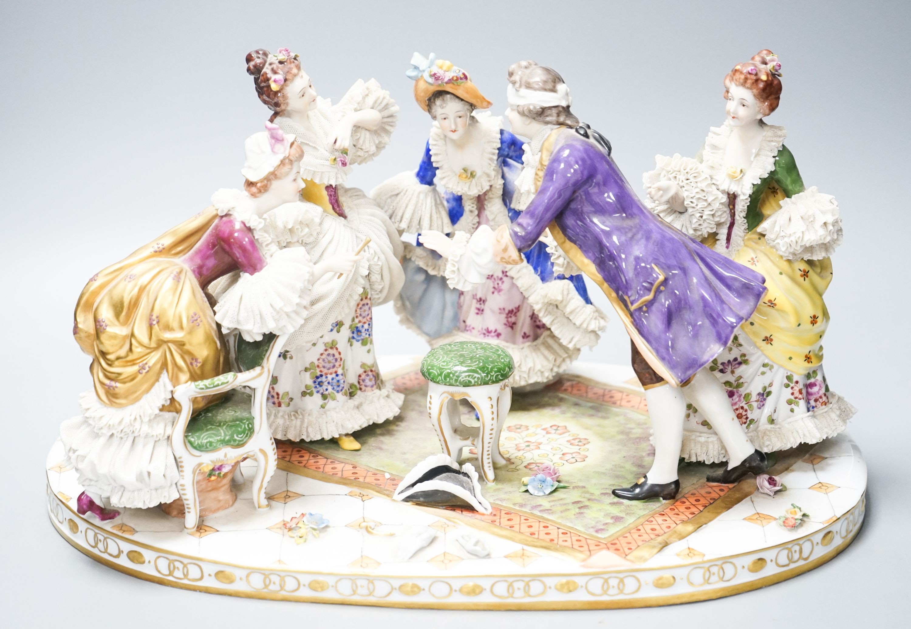 A large German porcelain ‘Blindman’s bluff’ group 46cm